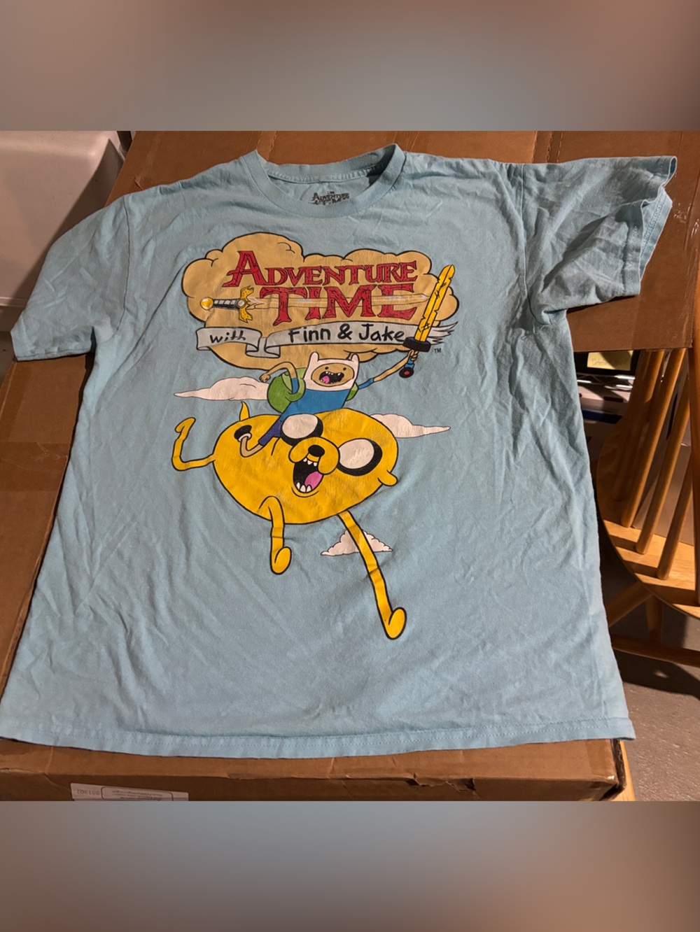 Adventure Time Light Blue Graphic Tee with Yellow Jake & Multicolor Print